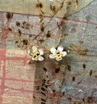 Image 1 of Flower stud earrings.