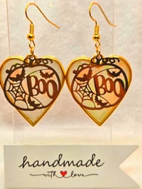 Image 2 of Handcrafted Resin Glow In The Dark Heart Shaped Pumkin " Boo" Earrings 