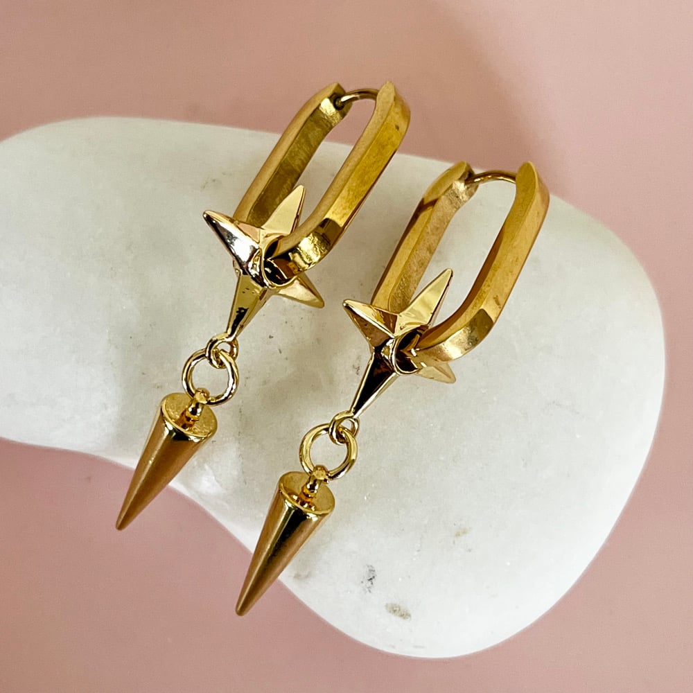 Image of Gold Star and Spike Oval Huggies