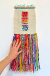 Rainbows and rectangles. Woven wall hanging.