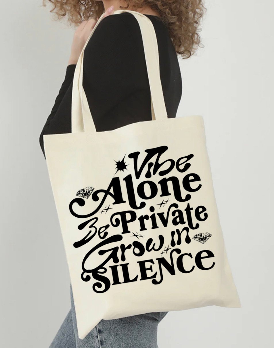 Vibe alone tote bag