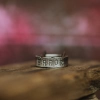 ERROR - Sterling silver ring - size R UK