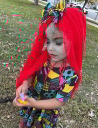 Image 2 of Sally halloween dress and bow.