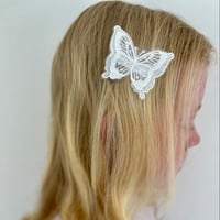 Image 1 of Whisper / Butterfly clip