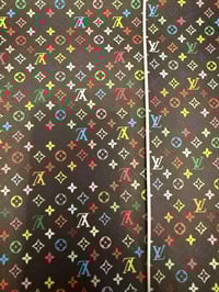 Image 1 of Black and color faux leather