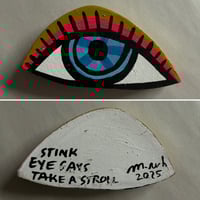 Image 1 of stink eye says take a stroll