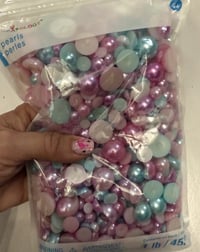 Image 1 of purple and teal flat back pearls