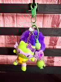 Image 1 of Ninga turtles x Hello Kitty #6 with bling bow / brown bead 