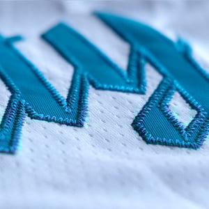 Image of Forever Teal - 2025 cream-alternate jersey 