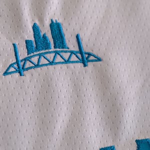 Image of Forever Teal - 2025 cream-alternate jersey 