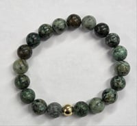 Pathfinder: African Turquoise Transformation Bracelet (with gold tone bead)