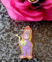 Fuzzy Monster With A Toothy Grin Keychain