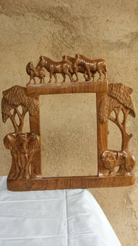 Image 1 of A bed side picture frame