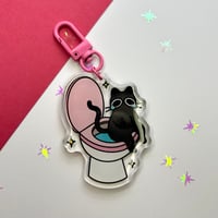 Image 1 of Cat on a Toilet 