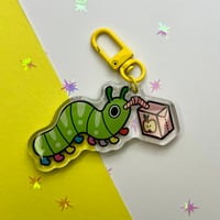 Image 1 of Bug Drinking Juice Keychain 