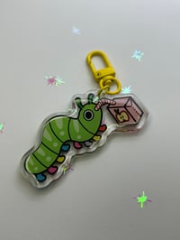 Image 2 of Bug Drinking Juice Keychain 