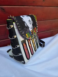Image 1 of X Ray Spex studded backpack with liquid shakers