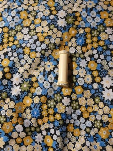 Image of Handkerchief - small - black with mustard, blue and white flowers