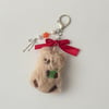 red bowed bear charm