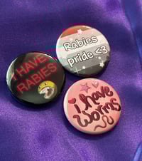 Image 1 of i have rabies/ rabies pride / i have worms 1.5" buttons