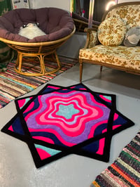 Spiral flowstar rug 
