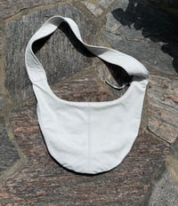 Image 2 of the white round bag