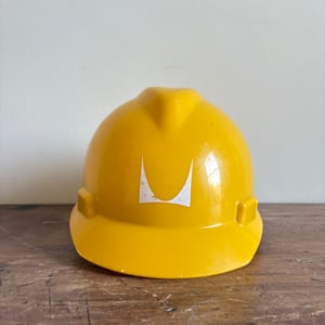 Image of Herman Miller Factory Hardhat (Yellow/White)