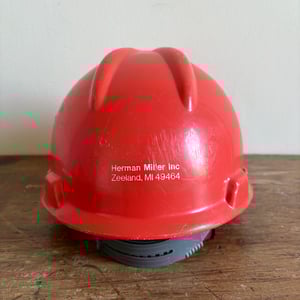 Image of Herman Miller Factory Hardhat (Orange/White)