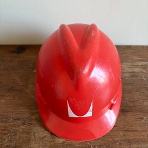 Image of Herman Miller Factory Hardhat (Orange/White)