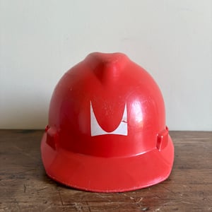 Image of Herman Miller Factory Hardhat (Orange/White)
