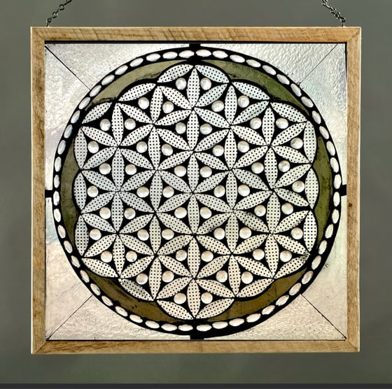 Image of  Clear textured Flower of Life glass mosaic with grout.
