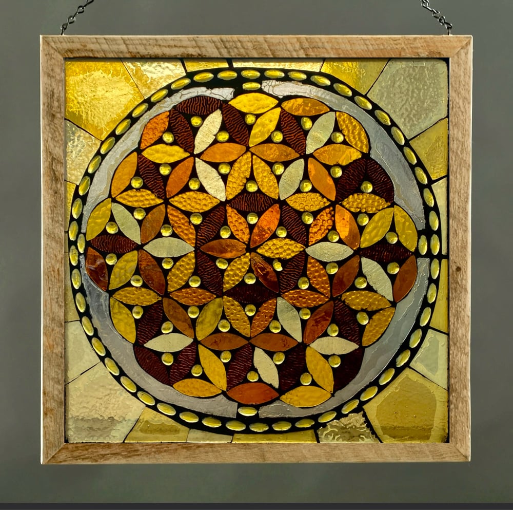Image of  Clear textured Flower of Life glass mosaic with grout.