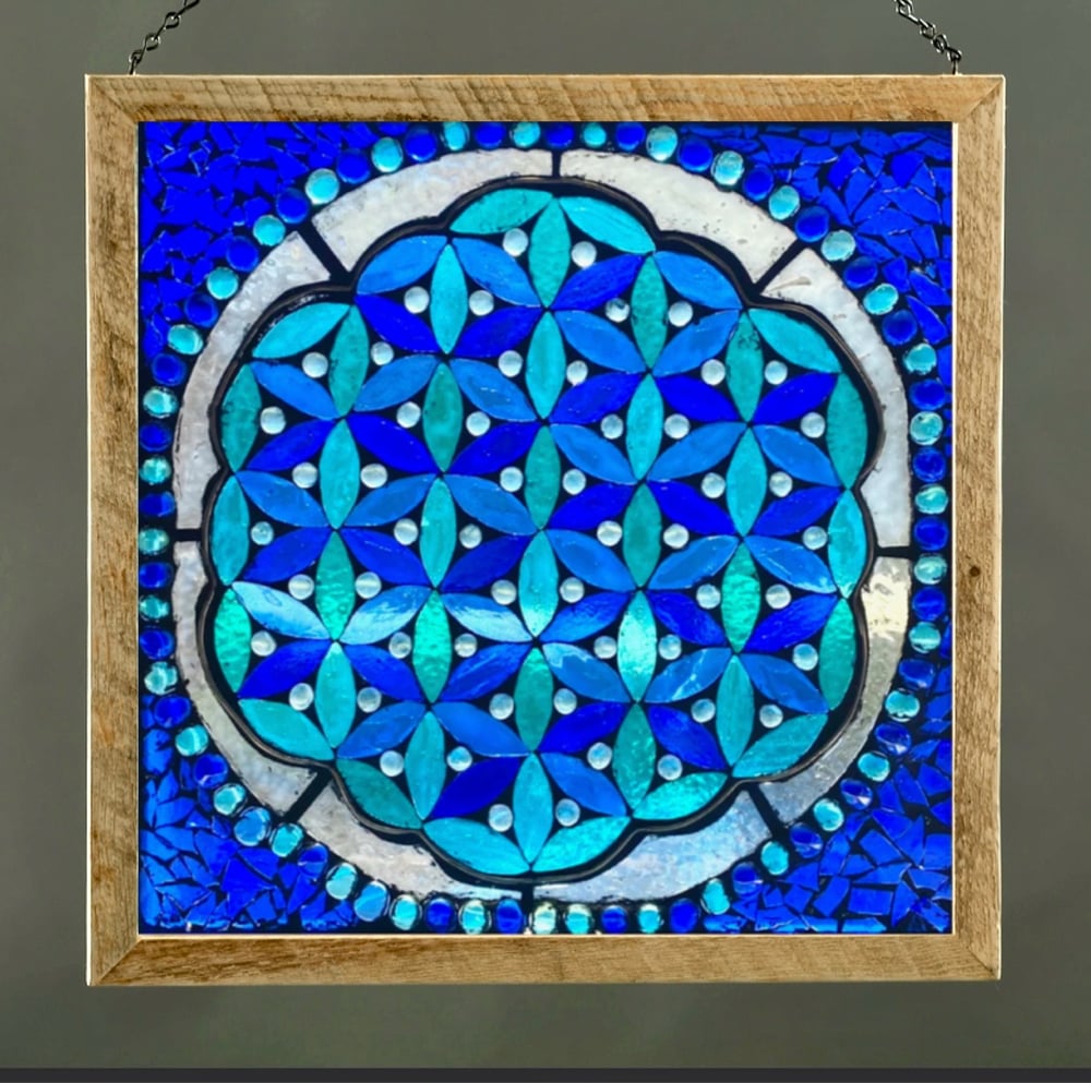 Image of  Clear textured Flower of Life glass mosaic with grout.
