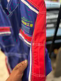 Image 3 of Toyota Tecno Red white and blue coveralls