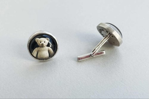 Image of "Certain in the..." cufflinks with rock crystals · CERTUS ADVERSUS INCERTA EST ·