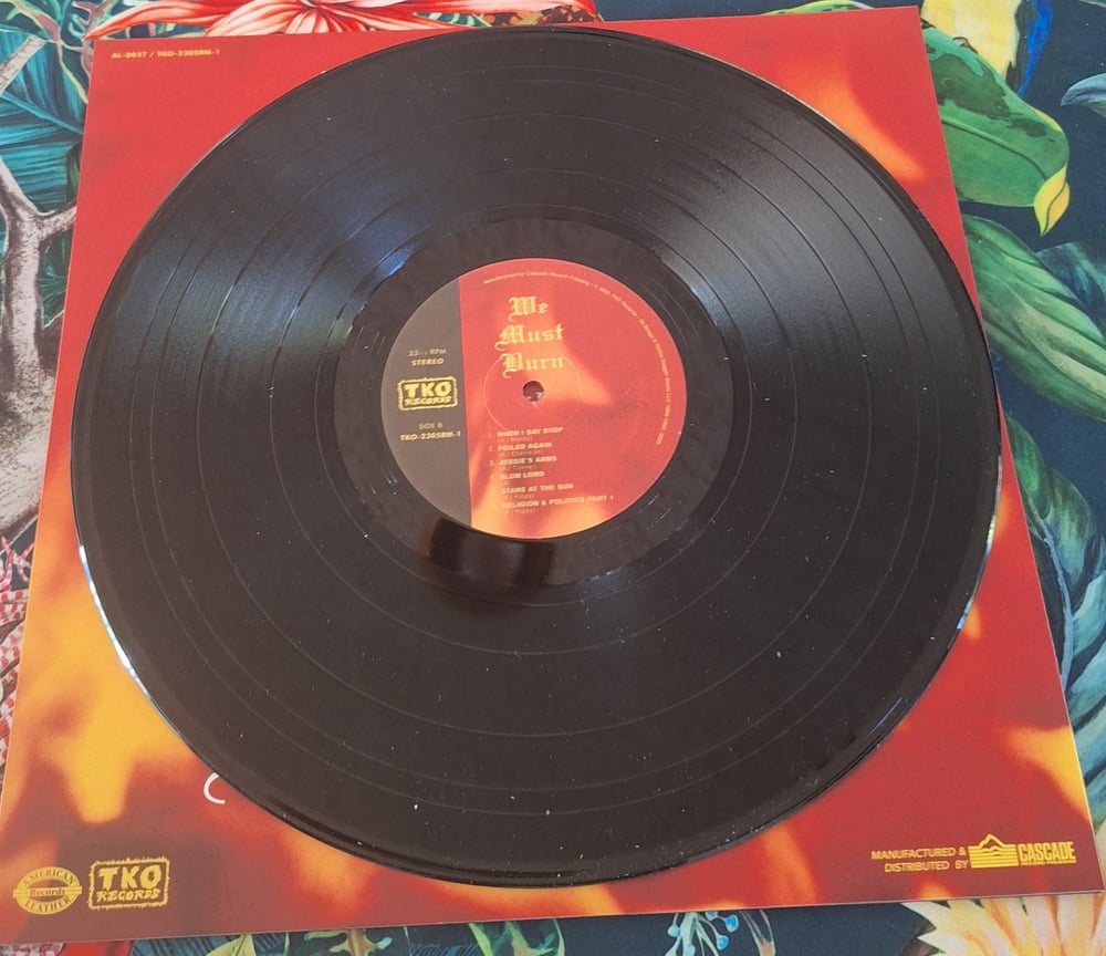 Image of WE MUST BURN single record issue 