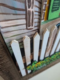 Image 2 of Yellow House behind fence