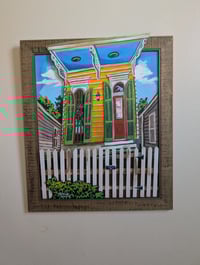 Image 1 of Yellow House behind fence