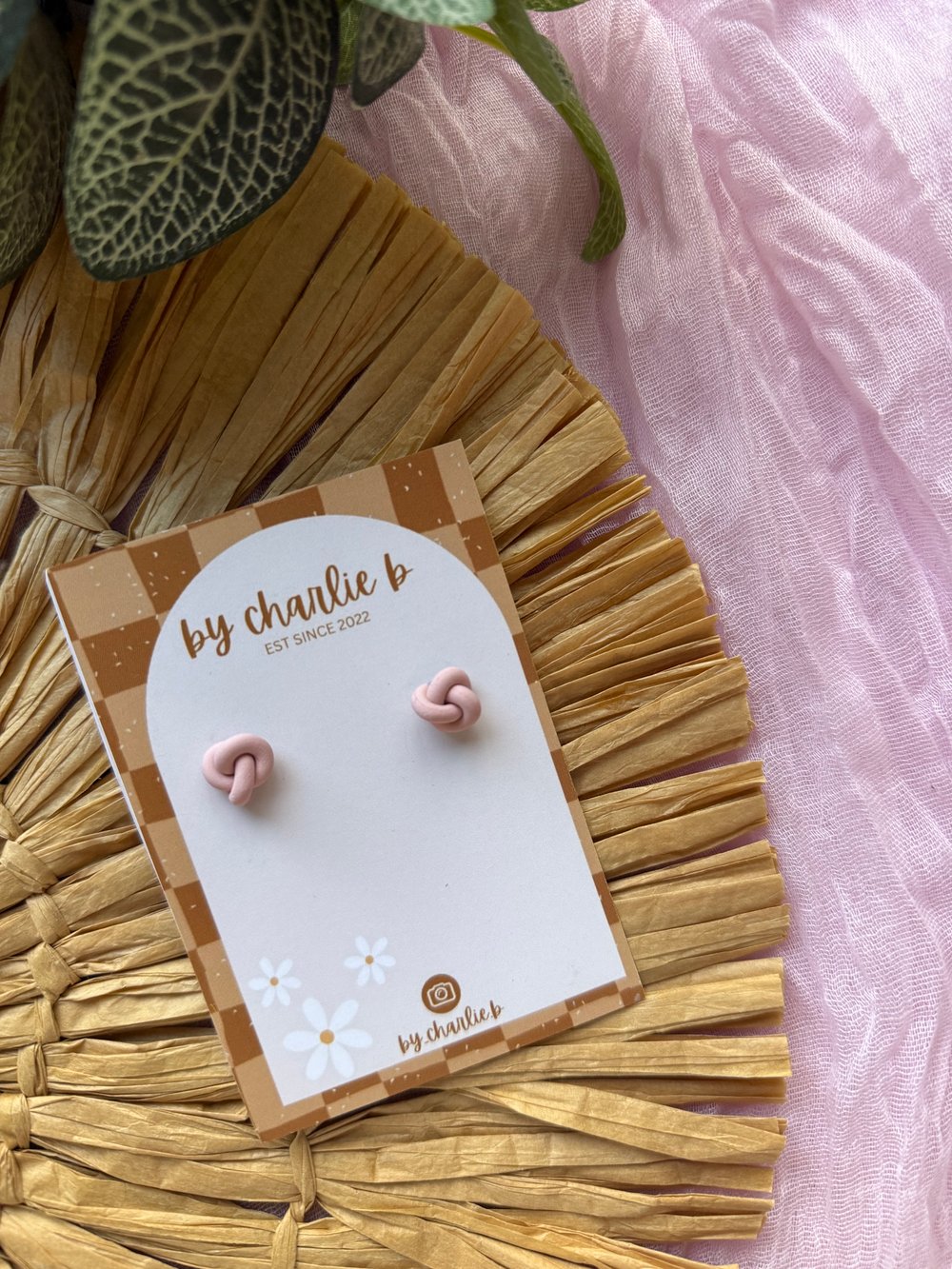 Image of peachy knot studs 