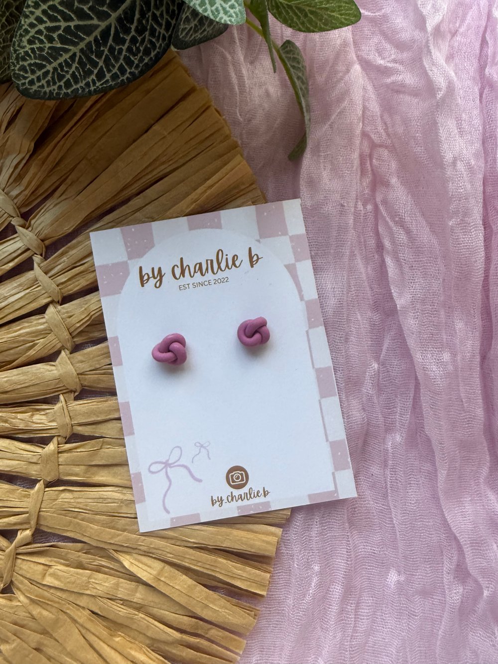 Image of mouve knot studs
