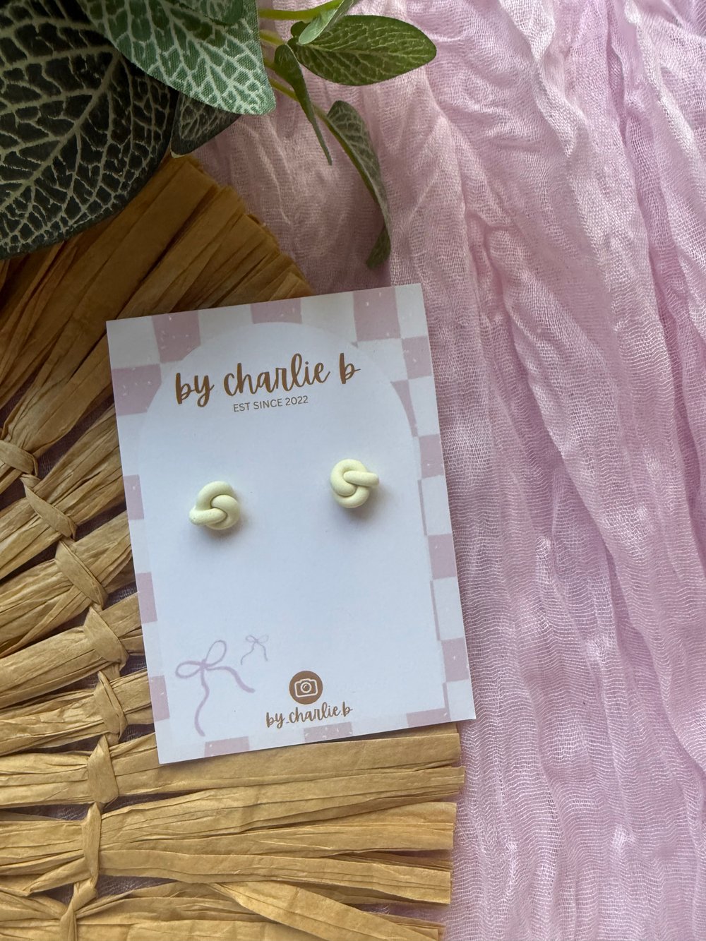 Image of baby yellow knot studs 