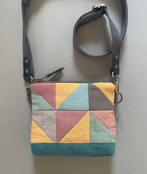 Image of Meadowsweet triangle, mini patchwork shoulder bag with plant-dyed panels and crossbody strap