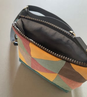 Image of Meadowsweet triangle, mini patchwork shoulder bag with plant-dyed panels and crossbody strap