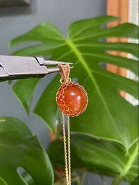 Image 1 of Golden Carnelian Coin Crystal Necklace