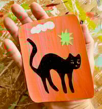 Image 2 of black cat