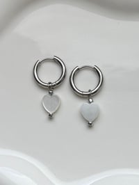 Image 1 of Mother of Pearl Heart Stainless Steel Huggies