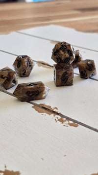 Image 1 of Molten metal 7 piece dice set