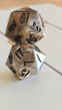 Image 3 of Molten metal oversized d20s 