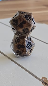 Image 1 of Molten metal oversized d20s 