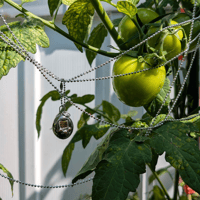 Image 2 of Platinum Tamagotchi Charm